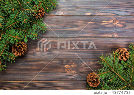 Christmas gray wooden background with fir tree 45774752