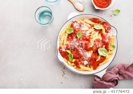 Tomato italian penne pasta served in pan 45776472