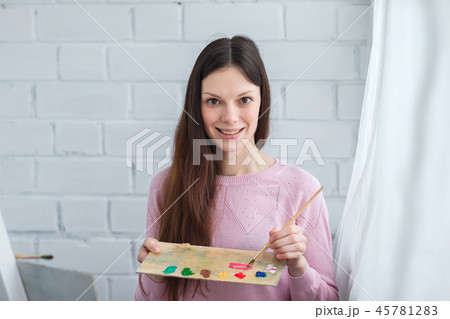 Beautiful woman draws 45781283