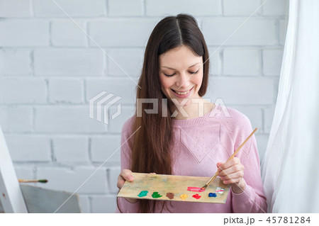 Beautiful woman draws 45781284