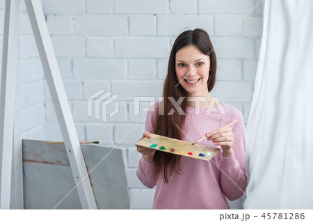 Beautiful woman draws 45781286