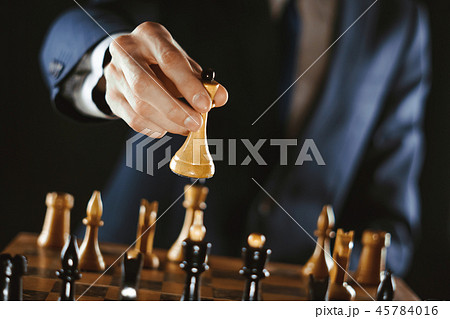 hand holding chess 45784016