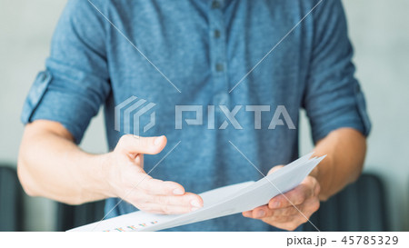 man hand point fact document business papers proof 45785329