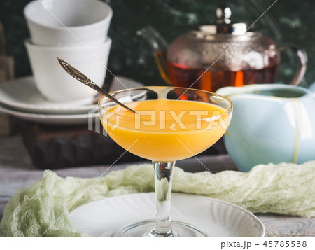 Lemon curd served in stemmed glass 45785538