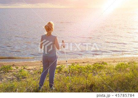 Beautiful young girl blonde in striped shirt Beautiful young girl blonde in striped shirt 45785784