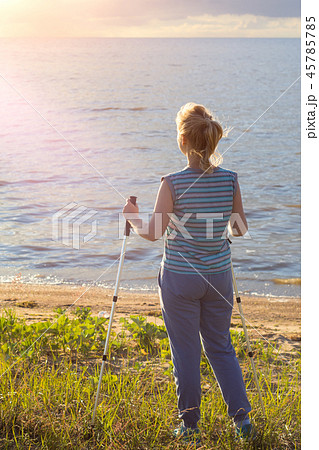 Beautiful young girl blonde in striped shirt Beautiful young girl blonde in striped shirt 45785785