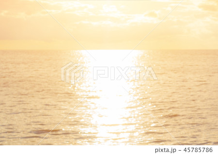 Dawn sea concept: Sun light and blur beach Dawn sea concept: Sun light and blur beach 45785786