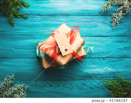 Christmas gift boxes on green background Christmas gift boxes on green background 45786287