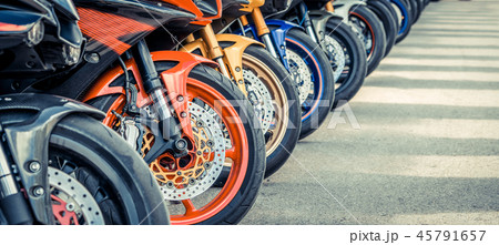 Motorcycles group parking on city street in summer 45791657