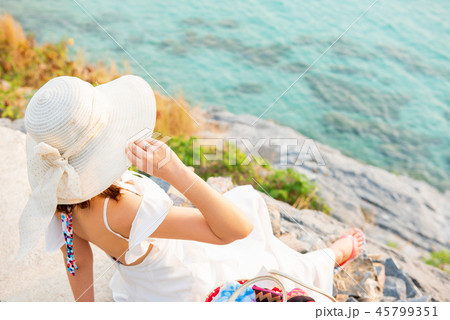 Beautiful women travel alone at the beach Summer 45799351