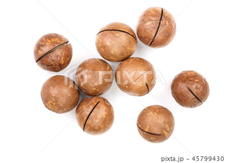 unshelled macadamia nuts isolated on white background. Top view. Flat lay pattern 45799430