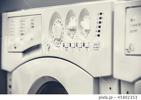 washing mashines closeup in appliance store washing mashines closeup in appliance store 45802353