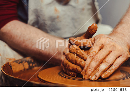Potter makes a jug Potter makes a jug 45804658