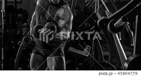 Handsome man with big muscles, posing at the camer 45804779
