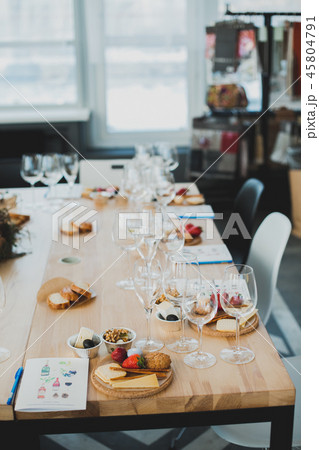 Table setting with wine and snacks, etiquette and event Table setting with wine and snacks, etiquette and event 45804791