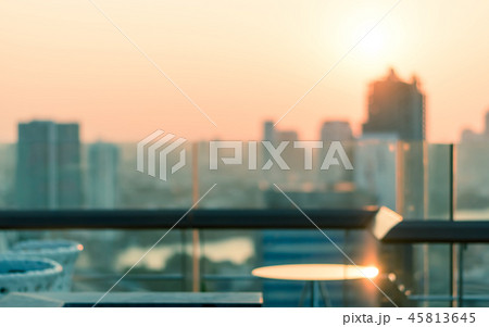 Rooftop party blur city view background sunset 45813645