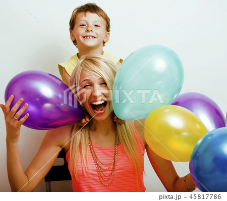 pretty real family with color balloons on white background, blon 45817786