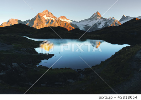Picturesque view on Bachalpsee lake in Swiss Alps mountains Picturesque view on Bachalpsee lake in Swiss Alps mountains 45818054