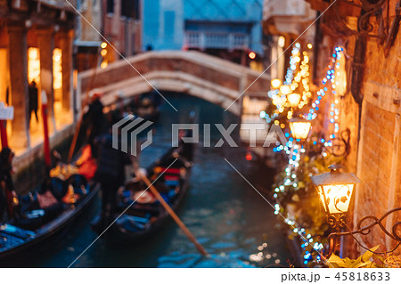 Venice canal late at night with street light illuminating Venice canal late at night with street light illuminating 45818633