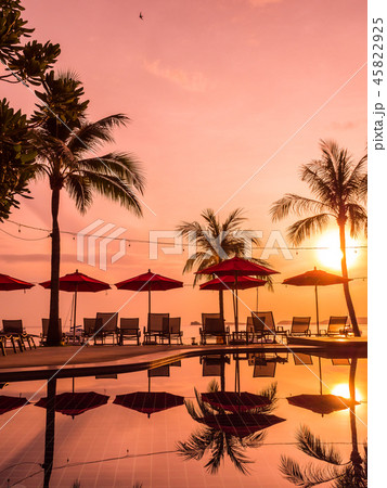 Umbrella and chair around outdoor swimming pool in hotel and resort Umbrella and chair around outdoor swimming pool in hotel and resort 45822925