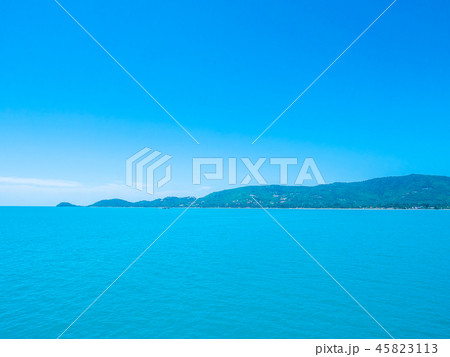 Beautiful tropical sea ocean with white cloud on blue sky background Beautiful tropical sea ocean with white cloud on blue sky background 45823113