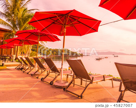 Umbrella and chair around outdoor swimming pool in hotel and resort Umbrella and chair around outdoor swimming pool in hotel and resort 45827007