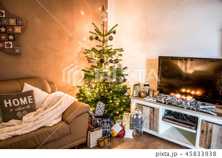 Merry Christmas beautiful living room tree setup aith gifts decorated for Happy Holidays at home 45833938