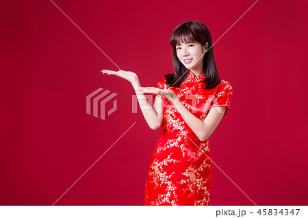 woman show something with cheongsam woman show something with cheongsam 45834347