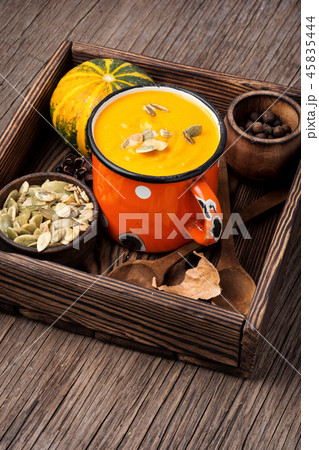 Pumpkin cream soup in mug 45835444