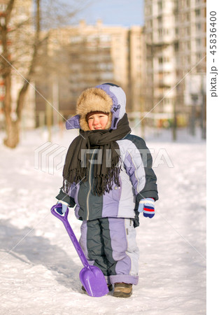 Boy enjoying the first snow 45836400