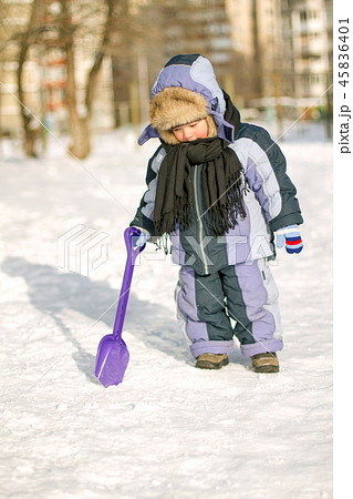 Boy enjoying the first snow 45836401
