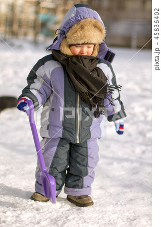 Boy enjoying the first snow 45836402