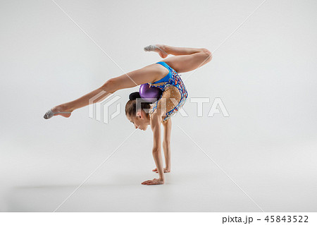 The teenager girl doing gymnastics exercises - Stock Photo [45843522] -  PIXTA