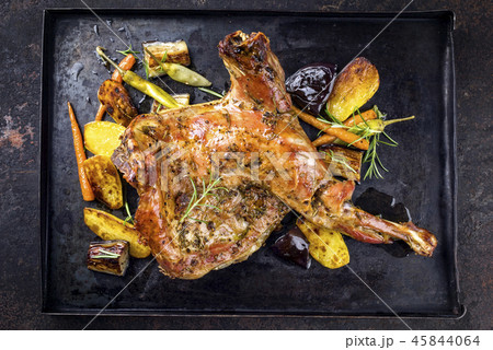 Barbecue Leg of Lamb and Shoulder with Potatoes an 45844064