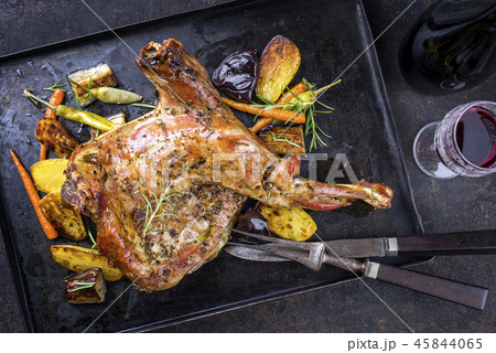 Barbecue Leg of Lamb and Shoulder with Potatoes an 45844065