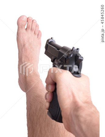 Man shooting himself in the foot 45845260