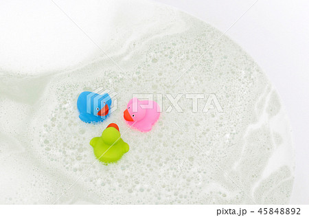 Pink, green and blue duck in a bathtub 45848892
