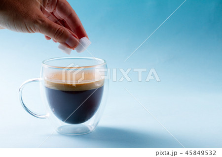 To cubes of sugar in spoon 45849532