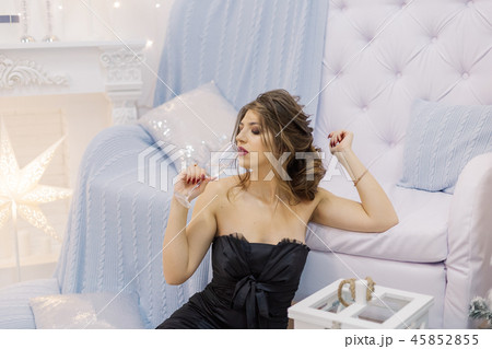 Very beautiful woman drinking champagne in new 45852855