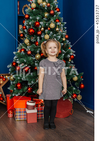 Very beautiful little girl standing at the Very beautiful little girl standing at the 45853737