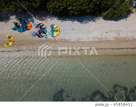 Aerial views, top view of kitesurfing on the waves 45858451