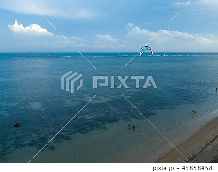 Aerial views, top view of kitesurfing on the waves Aerial views, top view of kitesurfing on the waves 45858458
