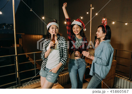 asian ladies celebrating christmas eve on roof 45860567