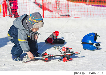 children fun activity ski resort winter outfit 45863564