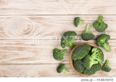 fresh broccoli on white wooden background with copy space for your text. Top view fresh broccoli on white wooden background with copy space for your text. Top view 45864849