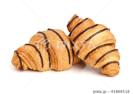 croissant decorated with chocolate sauce isolated on white background, top view croissant decorated with chocolate sauce isolated on white background, top view 45866516