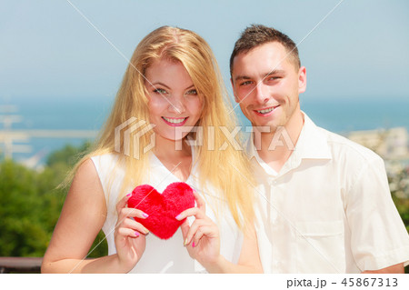 Happy romantic couple with holding heart 45867313