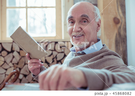 Close up of cheerful pensioner that posing on camera Close up of cheerful pensioner that posing on camera 45868082