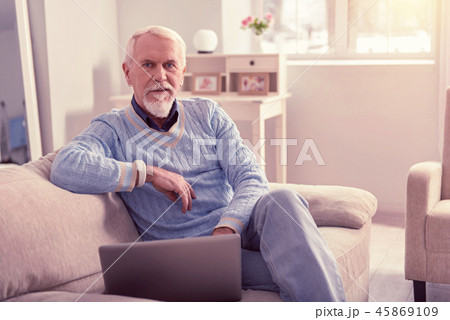 Insightful elder man wearing blue simple sweater Insightful elder man wearing blue simple sweater 45869109