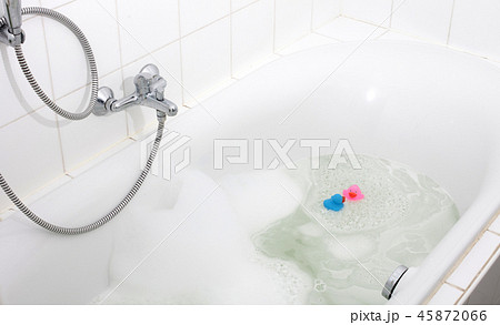 Pink and blue duck in a bathtub 45872066